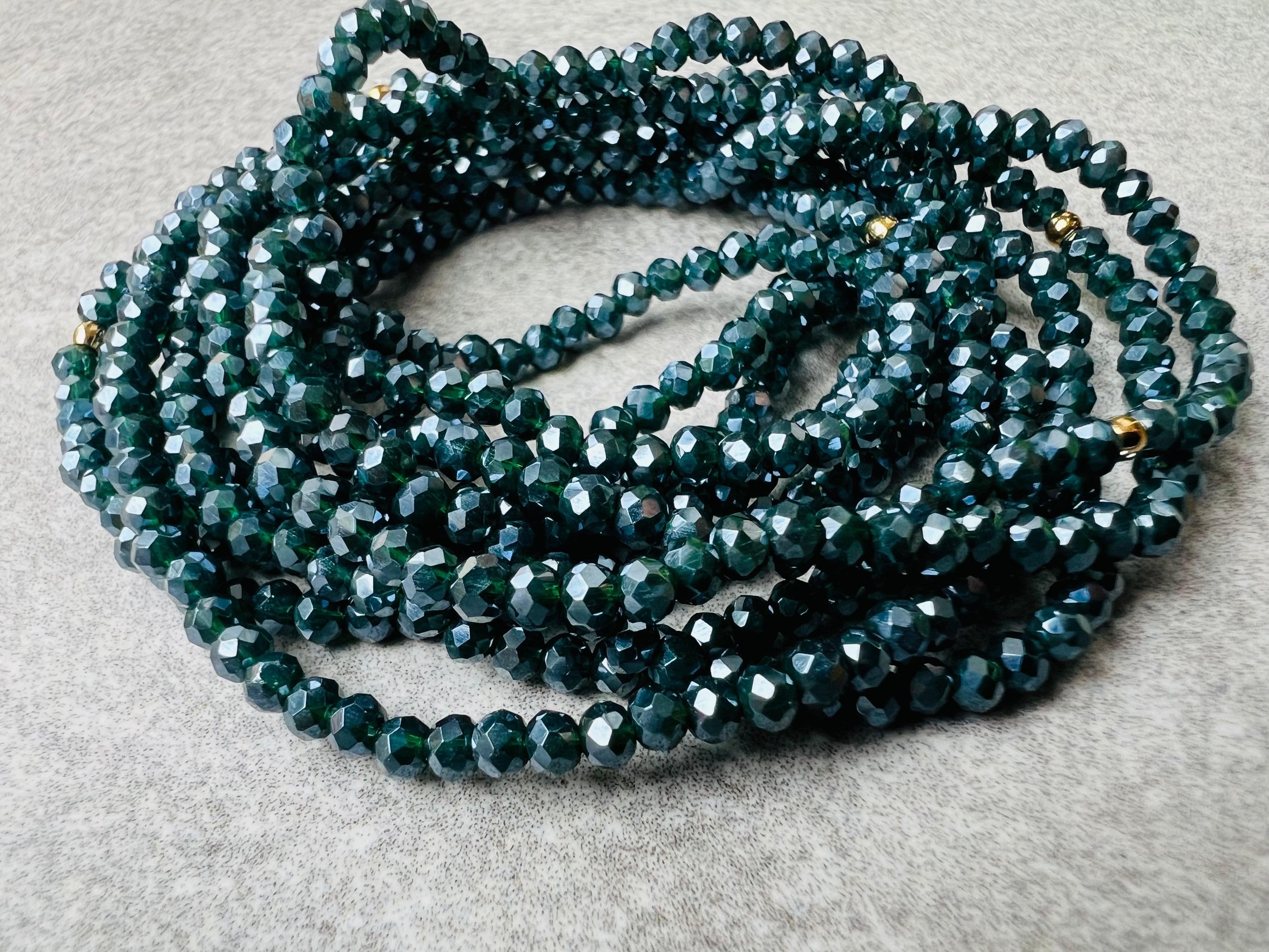 Bracelet GYSEL bleu pétrole brillant perles à facettes - Créations Uniques