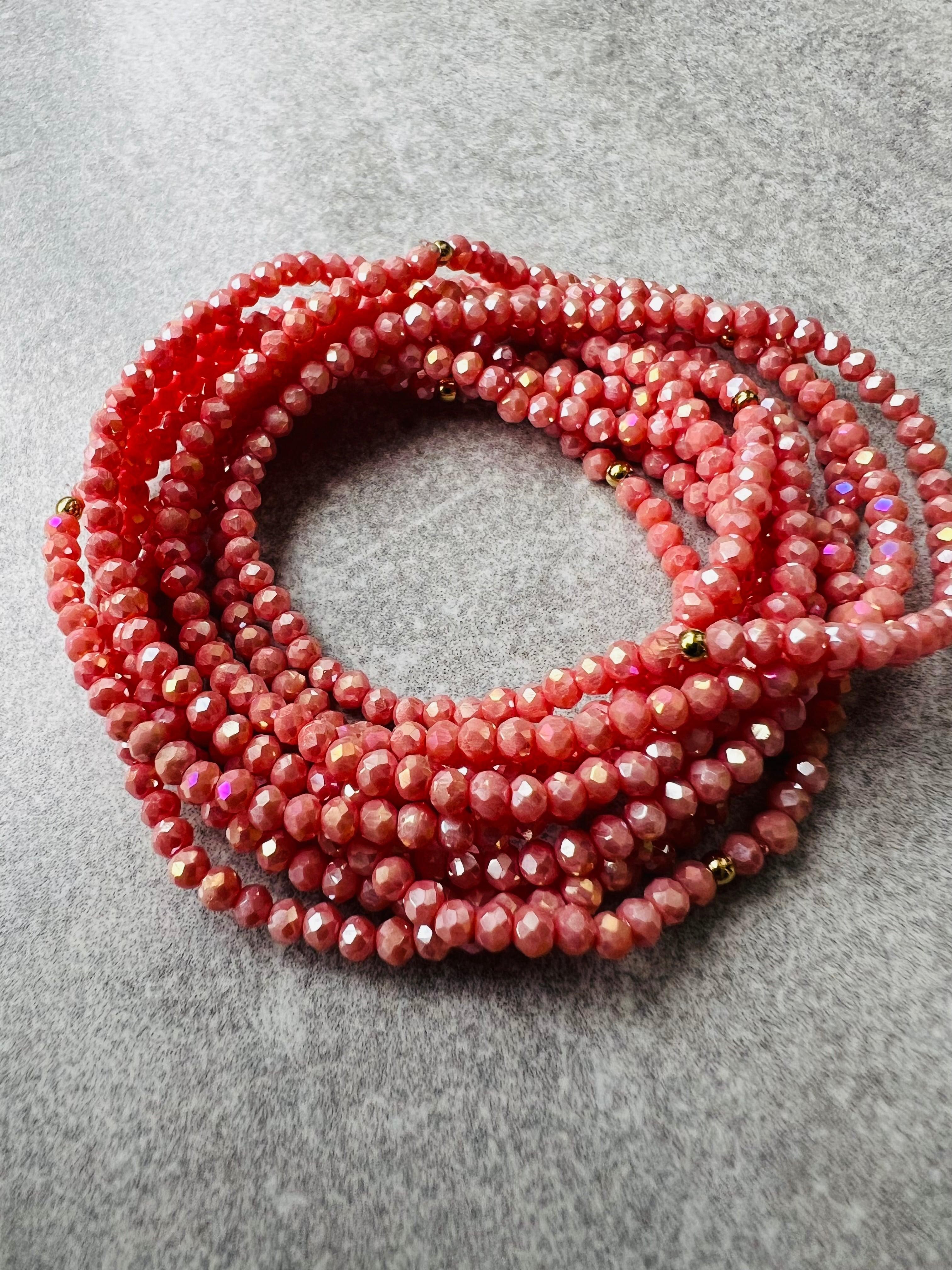 Bracelet GYSEL rose saumon brillant perles à facettes - Créations Uniques