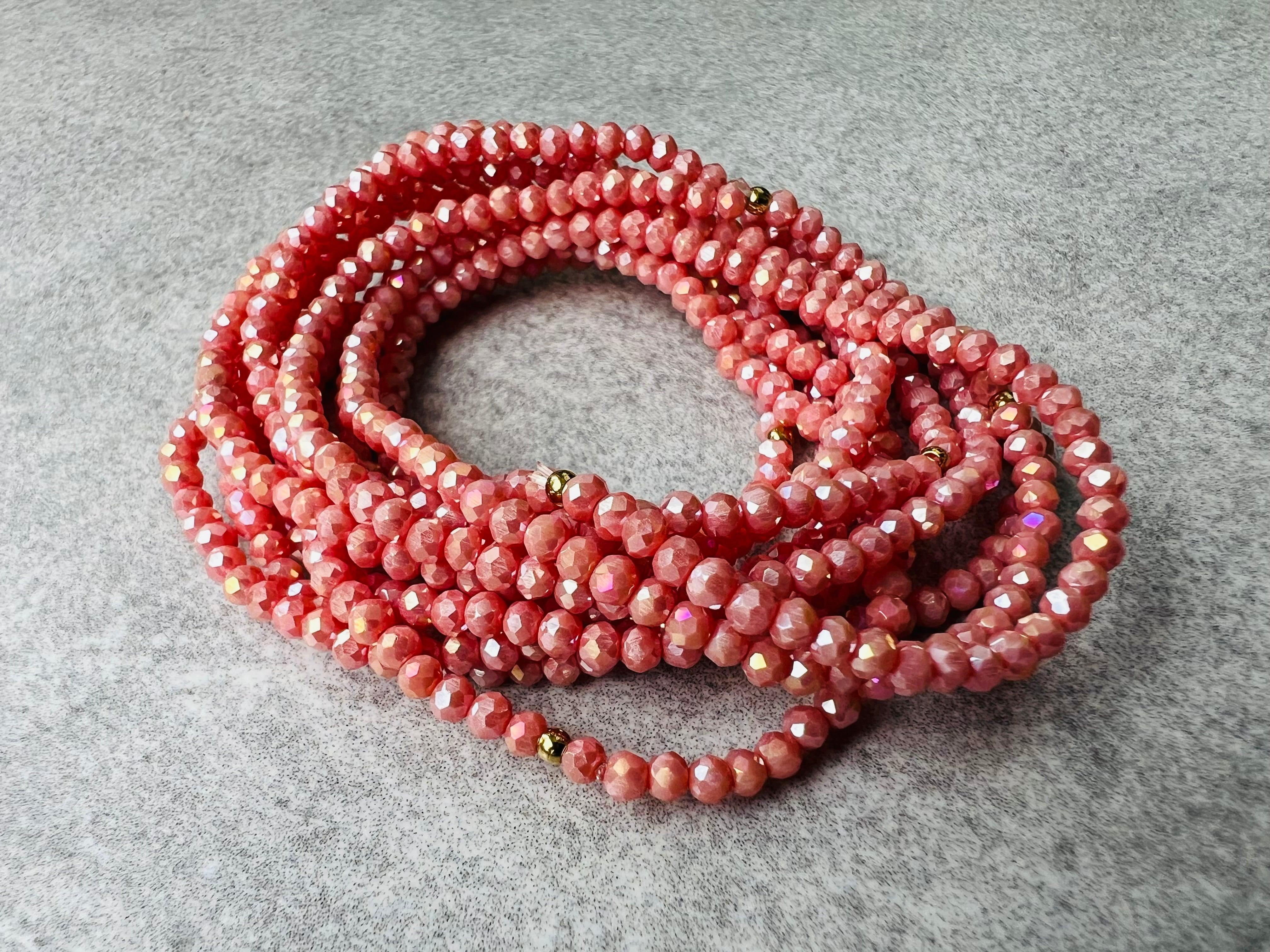 Bracelet GYSEL rose saumon brillant perles à facettes - Créations Uniques