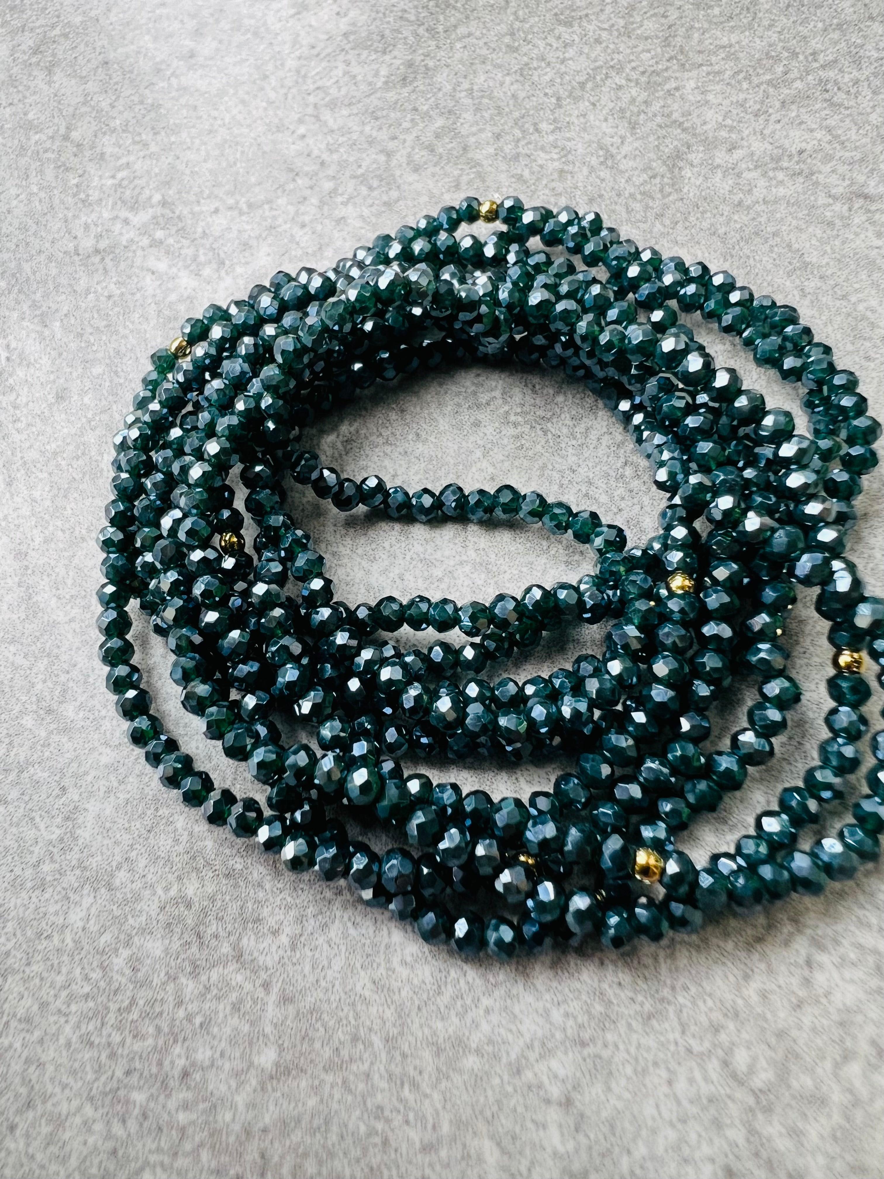 Bracelet GYSEL bleu pétrole brillant perles à facettes - Créations Uniques