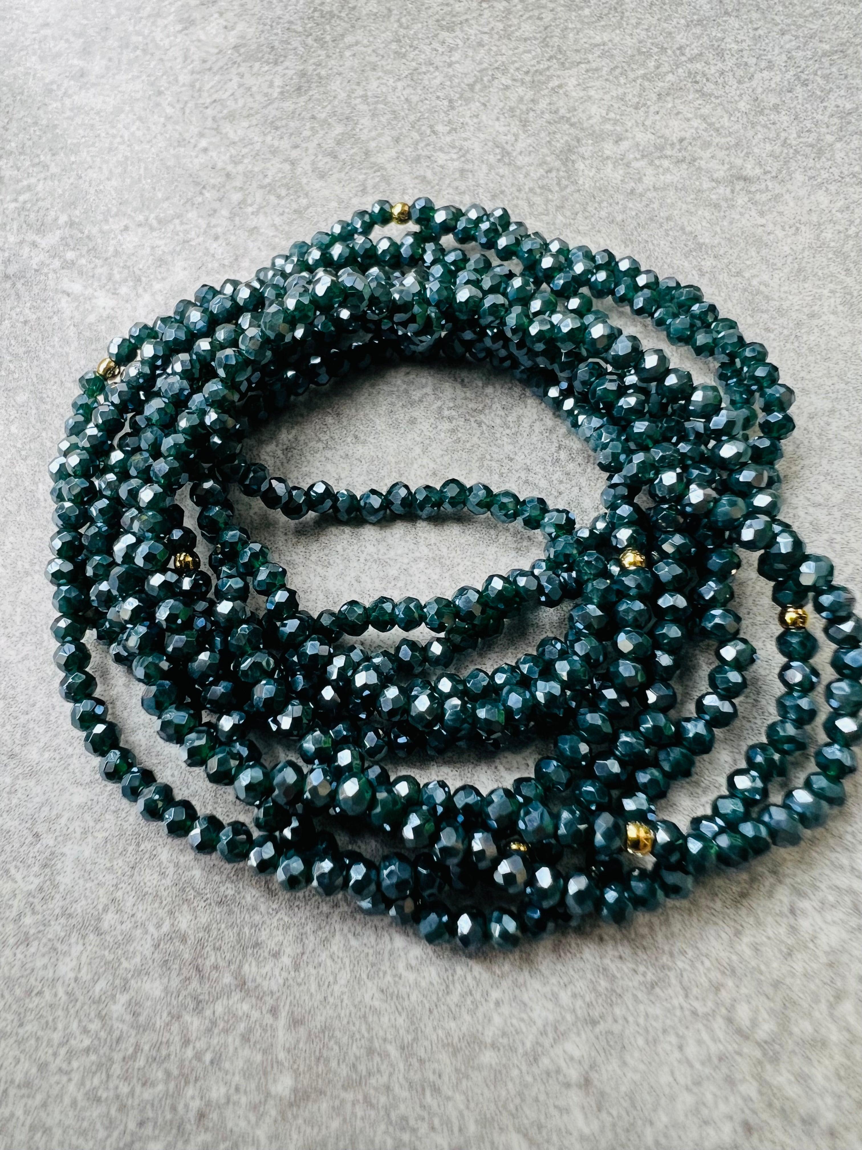 Bracelet GYSEL bleu pétrole brillant perles à facettes - Créations Uniques