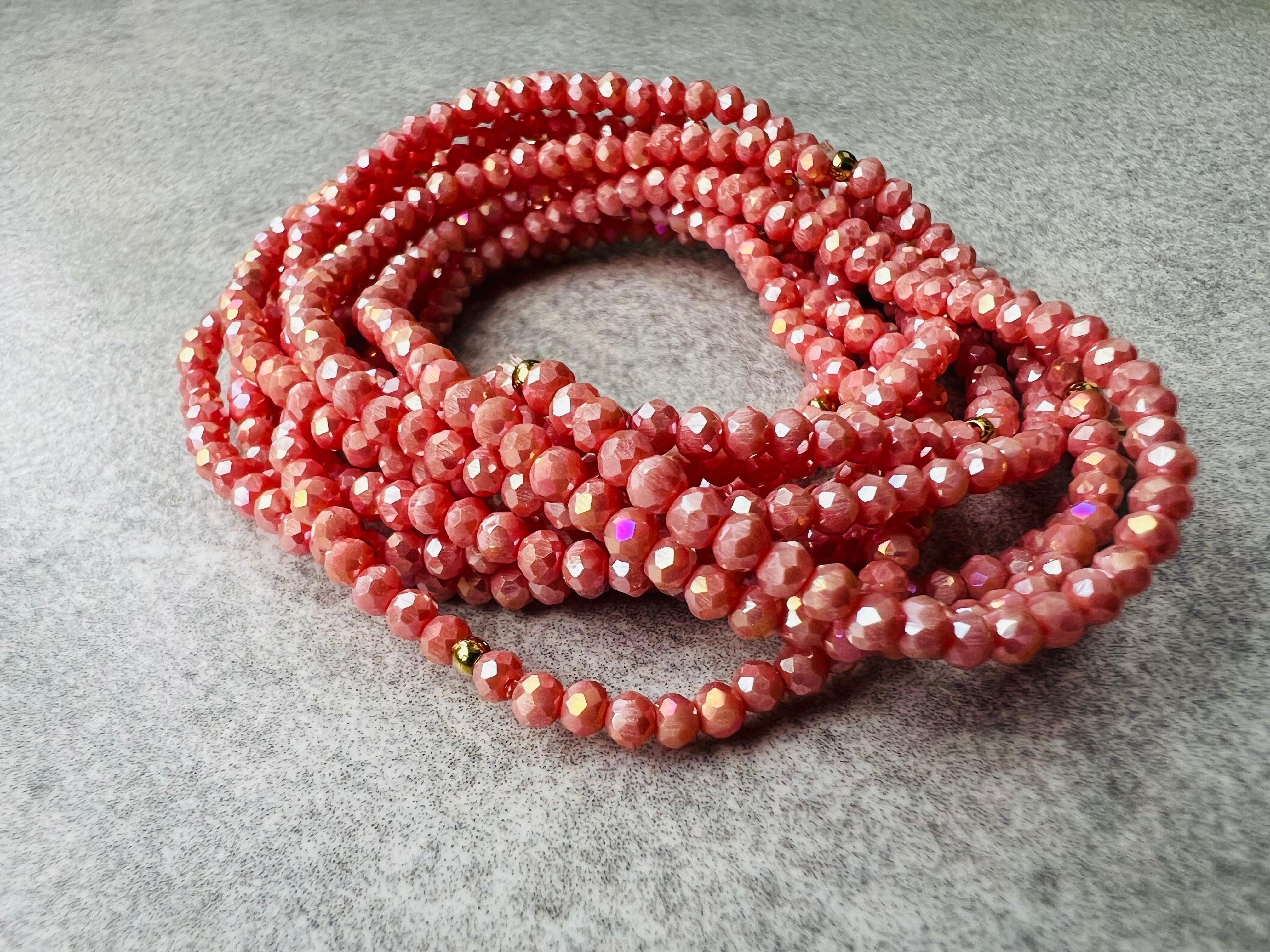 Bracelet GYSEL rose saumon brillant perles à facettes - Créations Uniques