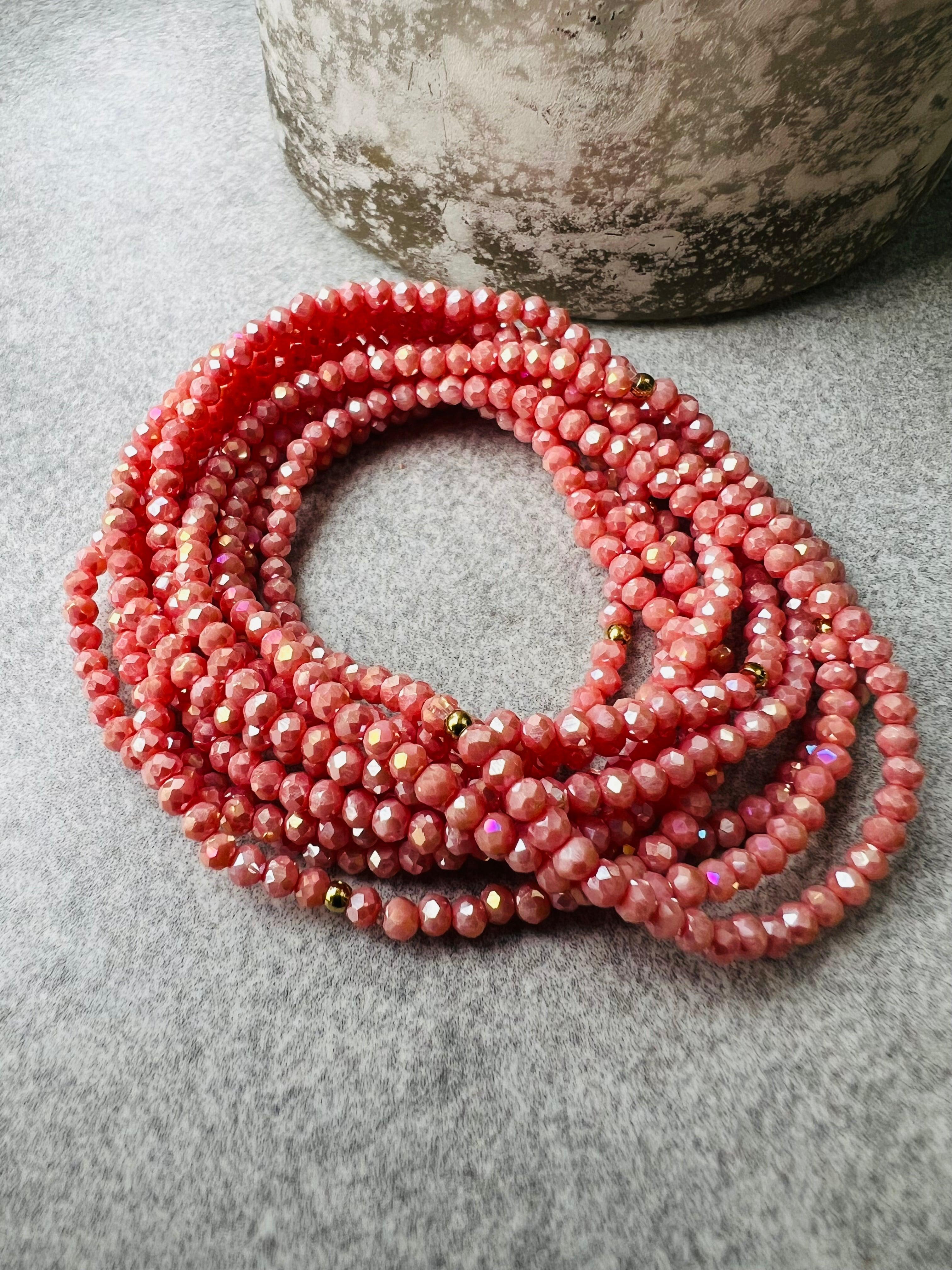 Bracelet GYSEL rose saumon brillant perles à facettes - Créations Uniques